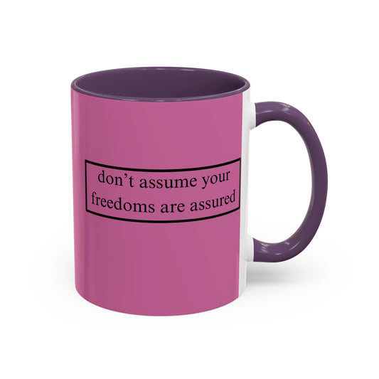 don't assume your freedoms are assured Black font Pink Accent Mug by theGreenDragonTavern.shop