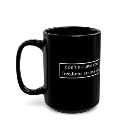 don't assume your freedoms are assured White font Black Mug by theGreenDragonTavern.shop