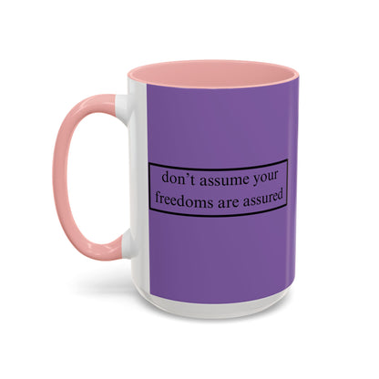 don't assume your freedoms are assured Black font Light Purple Accent Mug by theGreenDragonTavern.shop