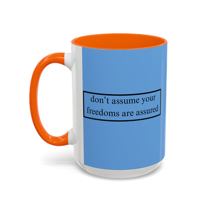 don't assume your freedoms are assured Black font Light Blue Accent Mug by theGreenDragonTavern.shop