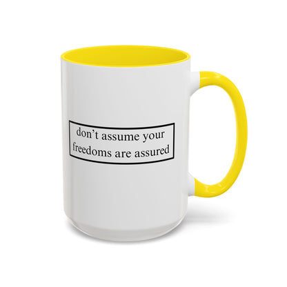 don't assume your freedoms are assured Black font White Accent Mug by theGreenDragonTavern.shop