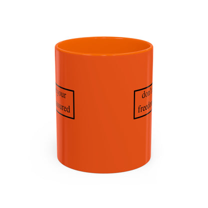 don't assume your freedoms are assured Black font Orange Accent Mug by theGreenDragonTavern.shop