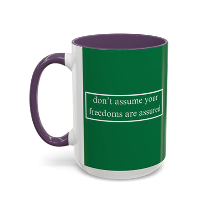 don't assume your freedoms are assured White font Green Accent Mug by theGreenDragonTavern.shop