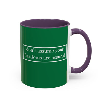 don't assume your freedoms are assured White font Green Accent Mug by theGreenDragonTavern.shop