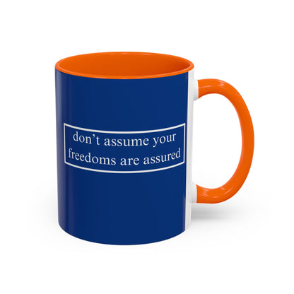 don't assume your freedoms are assured White font Blue Accent Mug by theGreenDragonTavern.shop