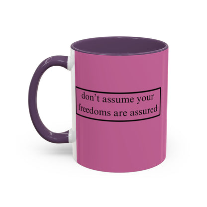 don't assume your freedoms are assured Black font Pink Accent Mug by theGreenDragonTavern.shop