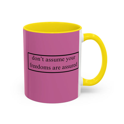 don't assume your freedoms are assured Black font Pink Accent Mug by theGreenDragonTavern.shop
