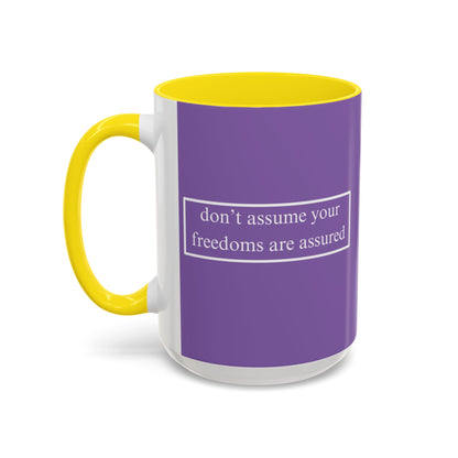 don't assume your freedoms are assured White font Light Purple Accent Mug by theGreenDragonTavern.shop