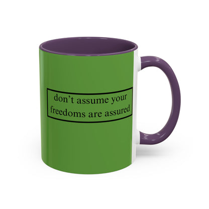 don't assume your freedoms are assured Black font Green Accent Mug by theGreenDragonTavern.shop