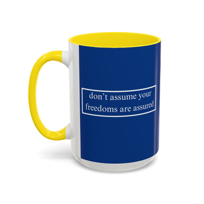 don't assume your freedoms are assured White font Blue Accent Mug by theGreenDragonTavern.shop