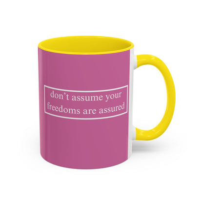 don't assume your freedoms are assured White font Pink Accent Mug by theGreenDragonTavern.shop