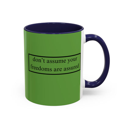 don't assume your freedoms are assured Black font Green Accent Mug by theGreenDragonTavern.shop