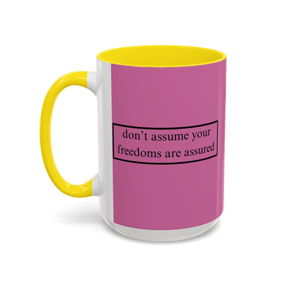 don't assume your freedoms are assured Black font Pink Accent Mug by theGreenDragonTavern.shop
