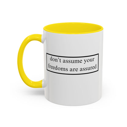 don't assume your freedoms are assured Black font White Accent Mug by theGreenDragonTavern.shop