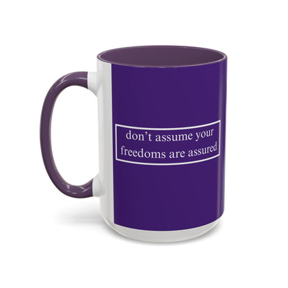 don't assume your freedoms are assured White font Dark Purple Accent Mug by theGreenDragonTavern.shop